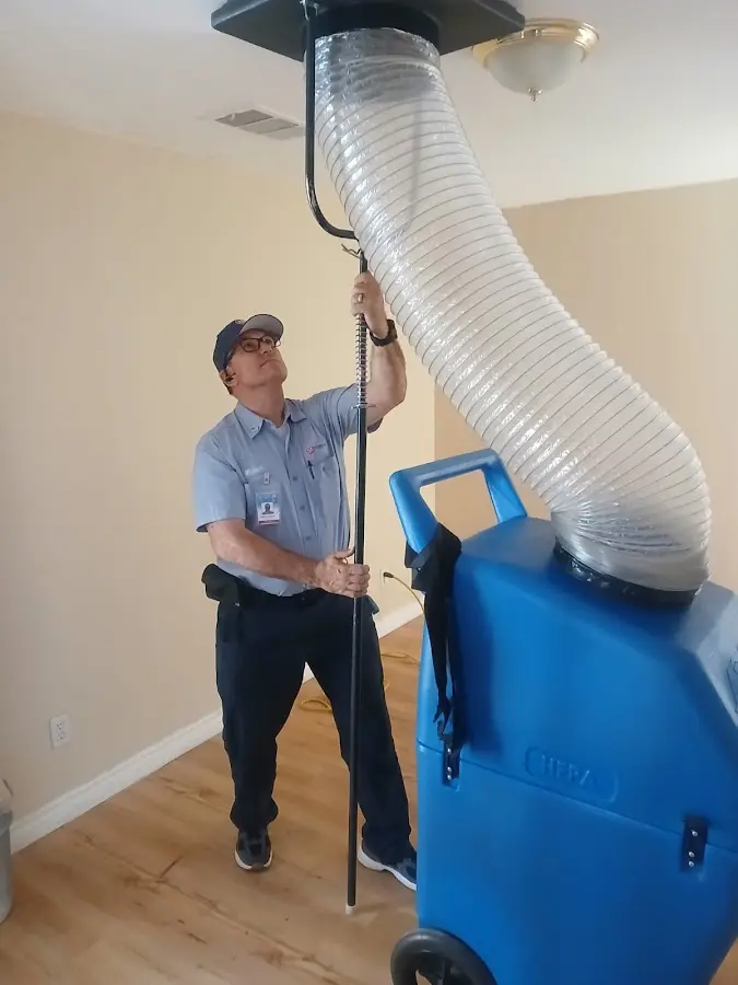 HVAC Installation technician using HEPA equipment in Eunice
